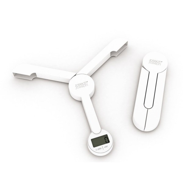 Ваги кухонні JJ-Waga TriScale біла, ТриСкейл, кухонні ваги, білого кольору, з прозорим дисплеєм та тарілкою 15 см — приклад використання для точного зважування інгредієнтів.