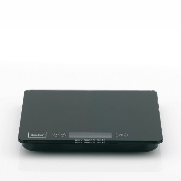 Вага кухонна електронна KELA, Pinta, чорна — приклад застосування: для точного зважування інгредієнтів під час приготування та випічки.